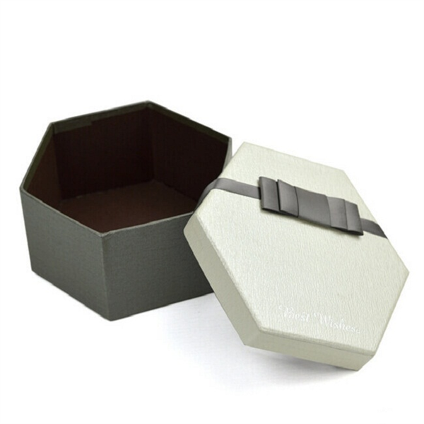 Boîte hexagonale de rangement en carton beige