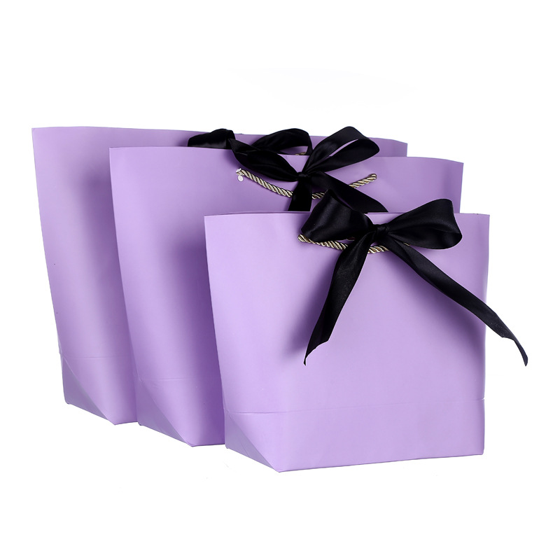 Chine Fabricant de sacs-cadeaux d'emballage en papier de mode en gros